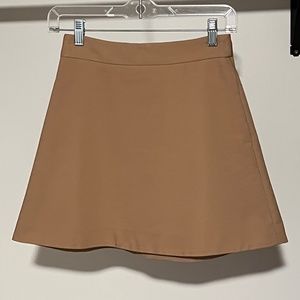Tan mini skirt